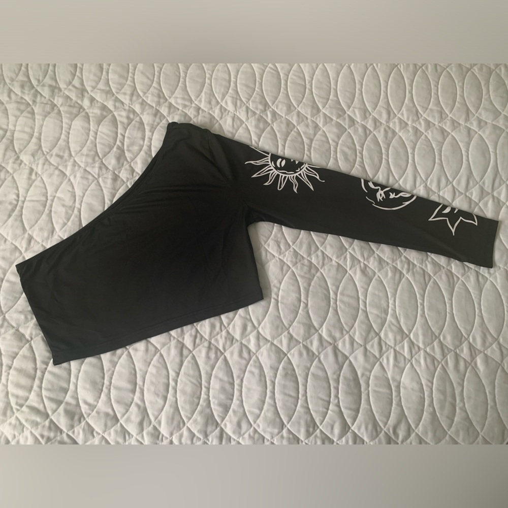 #2 Black silky one-shoulder crop w/celestial graphics on arm